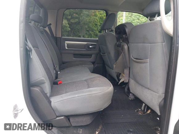 2013 Ram 2500 SLT z VIN 3C6TR5DT7DG524758, wystawiony jako IAAI lot #42333873 z przebiegiem Nie podano mil oraz . Historia ofert i sprzedaży dostępna na DreamBid. Obrazek 8.