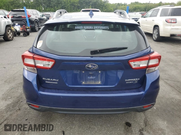 2018 Subaru Impreza Premium with VIN 4S3GTAD66J3722745, listed as a Copart auction lot 57894185 with 63,571 mi miles and Salvage title. Bid and sale history available at DreamBid. Image 6.
