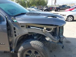 2019 Ram 1500 Rebel z VIN 1C6SRFLT2KN696557, wystawiony jako IAAI lot #42110931 z przebiegiem 81 372 mil mil oraz . Historia ofert i sprzedaży dostępna na DreamBid. Obrazek 19.