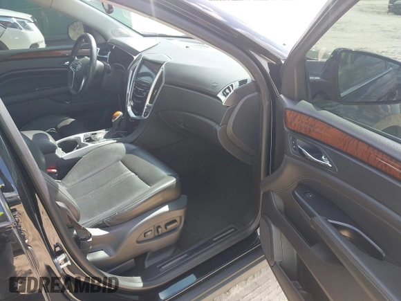 2016 Cadillac SRX Luxury Collection with VIN 3GYFNBE32GS556740, listed as a IAAI auction lot 42017371 with 82,175 mi miles. Bid and sale history available at carsss.com. Image 5.