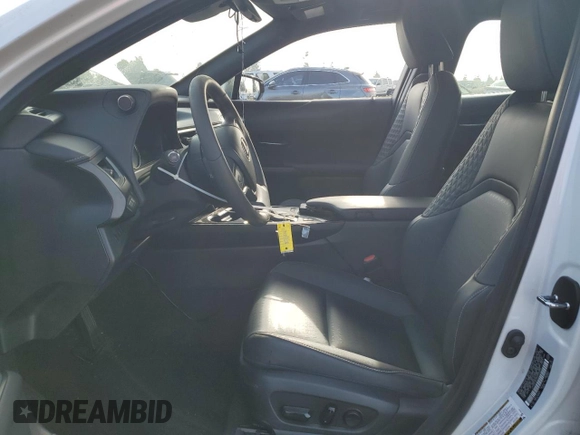 2022 Lexus UX 250h with VIN JTHX9JBH2N2056285, listed as a Copart auction lot 87221214 with 33,377 mi miles and Salvage title. Bid and sale history available at DreamBid. Image 7.