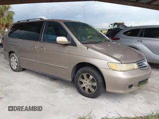 2004 Honda Odyssey EX-L with VIN 5FNRL18004B043141, listed as a IAAI auction lot 42557081 with 278,112 mi miles and . Bid and sale history available at DreamBid. Image 1.