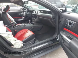 2018 Ford Mustang EcoBoost Premium with VIN 1FATP8UHXJ5136640, listed as a IAAI auction lot 41337482 with 95,471 mi miles and . Bid and sale history available at carsss.com. Image 5.