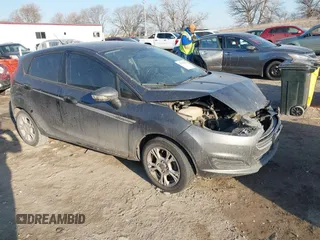 2015 Ford Fiesta SE with VIN 3FADP4EJ6FM121102, listed as a IAAI auction lot 41707187 with 136,607 mi miles. Bid and sale history available at carsss.com. Image 1.