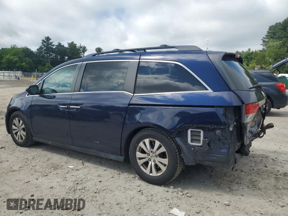 2014 Honda Odyssey EX-L with VIN 5FNRL5H61EB114764, listed as a Copart auction lot 61189305 with 167,185 mi miles and Clean title. Bid and sale history available at DreamBid. Image 2.