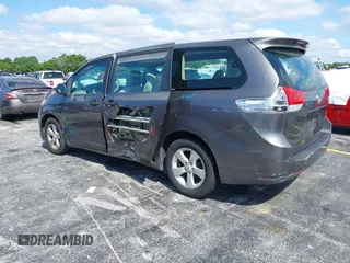 2012 Toyota Sienna with VIN 5TDZK3DC8CS190719, listed as a IAAI auction lot 41983695 with 68,377 mi miles and . Bid and sale history available at DreamBid. Image 3.