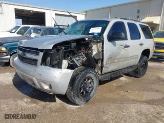 2010 Chevrolet Tahoe LS with VIN 1GNUKAE01AR243959, listed as a IAAI auction lot 41630500 with 195,850 mi miles. Bid and sale history available at carsss.com. Image 2.