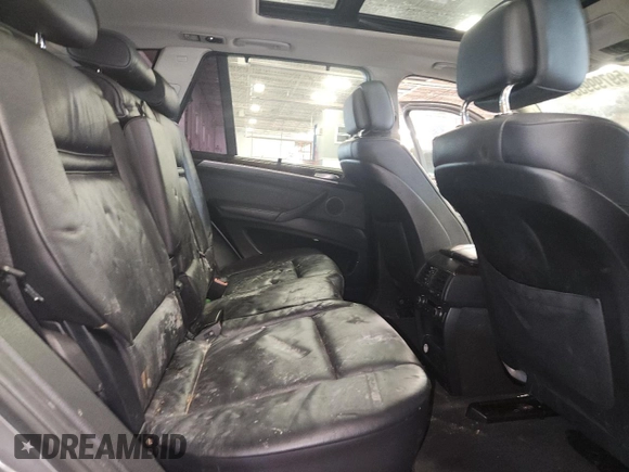 2012 BMW X5 35i z VIN 5UXZV4C58CL758466, wystawiony jako Copart lot #59799955 z przebiegiem 119 331 mil mil oraz Nie do naprawy • Non repairable. Historia ofert i sprzedaży dostępna na DreamBid. Obrazek 11.