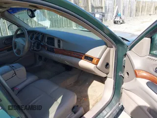 2003 Buick LeSabre Custom with VIN 1G4HP54K534179068, listed as a IAAI auction lot 41930360 with 164,637 mi miles and . Bid and sale history available at carsss.com. Image 5.