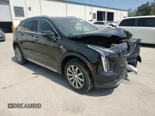 2021 Cadillac XT4 FWD Premium Luxury z VIN 1GYFZCR48MF002468, wystawiony jako Copart lot #50878955 z przebiegiem 76 034 mil mil oraz Szkoda całkowita • Salvage title. Historia ofert i sprzedaży dostępna na DreamBid. Obrazek 11.