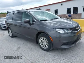 2021 Chrysler Voyager LXi with VIN 2C4RC1DG2MR542658, listed as a IAAI auction lot 42171818 with 62,123 mi miles and . Bid and sale history available at DreamBid. Image 1.