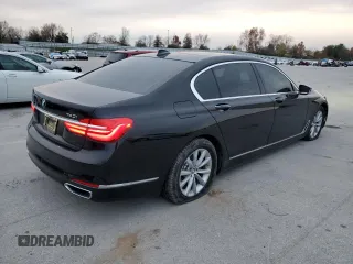 2018 BMW 7 Series 740i xDrive with VIN WBA7E4C50JGV23975, listed as a Copart auction lot 82354264 with 63,657 mi miles and Salvage Title. Bid and sale history available at carsss.com. Image 3.