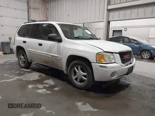 2004 GMC Envoy SLT z VIN 1GKDT13S442175992, wystawiony jako IAAI lot #42078618 z przebiegiem 125 636 mil mil oraz . Historia ofert i sprzedaży dostępna na DreamBid. Obrazek 1.