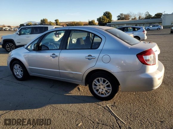 2012 Suzuki SX4 LE with VIN JS2YC5A33C6301529, listed as a Copart auction lot 79363394 with 72,348 mi miles and Clean Title. Bid and sale history available at carsss.com. Image 2.
