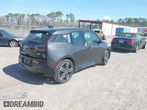 2014 BMW i3 with VIN WBY1Z4C54EV273699, listed as a IAAI auction lot 41549973 with 109,947 mi miles and . Bid and sale history available at DreamBid. Image 4.