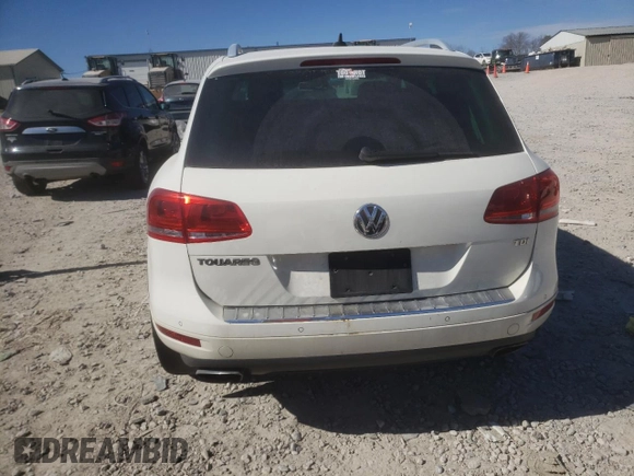 2012 Volkswagen Touareg Sport z VIN WVGFK9BP5CD000233, wystawiony jako Copart lot #46517515 z przebiegiem 198 242 mil mil oraz Szkoda całkowita • Salvage title. Historia ofert i sprzedaży dostępna na DreamBid. Obrazek 6.
