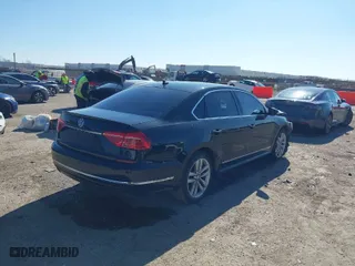 2016 Volkswagen Passat 1.8T SEL Premium with VIN 1VWCS7A31GC035550, listed as a IAAI auction lot 41478977 with 126,190 mi miles. Bid and sale history available at carsss.com. Image 4.