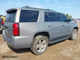 2017 Chevrolet Tahoe LT with VIN 1GNSCBKC2HR260627, listed as a IAAI auction lot 41580613 with 156,650 mi miles. Bid and sale history available at carsss.com. Image 4.
