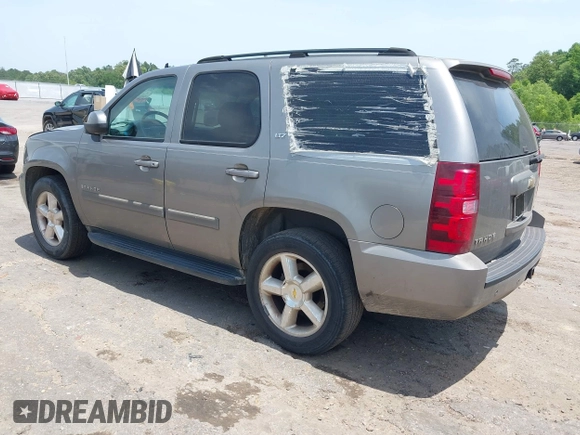 2007 Chevrolet Tahoe LT z VIN 1GNFC130X7R263516, wystawiony jako IAAI lot #42259629 z przebiegiem 215 970 mil mil oraz . Historia ofert i sprzedaży dostępna na DreamBid. Obrazek 3.