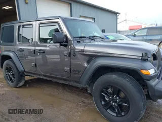 2023 Jeep Wrangler Sport S with VIN 1C4HJXDN6PW653924, listed as a IAAI auction lot 41413689 with 15,278 mi miles and . Bid and sale history available at DreamBid. Image 14.