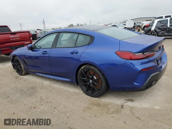 2023 BMW 8 Series 840i with VIN WBAGV2C01PCK32930, listed as a Copart auction lot 82891334 with 0 mi miles and Salvage Title. Bid and sale history available at carsss.com. Image 2.