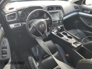 2016 Nissan Maxima S with VIN 1N4AA6AP3GC902446, listed as a Copart auction lot 48993185 with 104,453 mi miles and Salvage title. Bid and sale history available at DreamBid. Image 8.