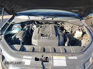 2010 Audi Q7 Premium Plus with VIN WA1LYAFE2AD006417, listed as a IAAI auction lot 41312214 with 122,281 mi miles and . Bid and sale history available at DreamBid. Image 10.
