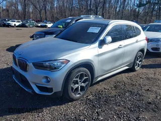 2018 BMW X1 xDrive28i with VIN WBXHT3C30J5L29757, listed as a IAAI auction lot 41879504 with 60,490 mi miles. Bid and sale history available at carsss.com. Image 18.