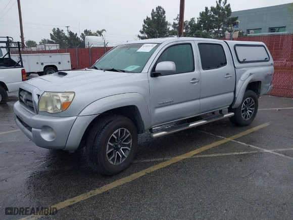 2007 Toyota Tacoma with VIN 3TMLU42N77M009397, listed as a IAAI auction lot 41805139 with 256,744 mi miles. Bid and sale history available at carsss.com. Image 2.