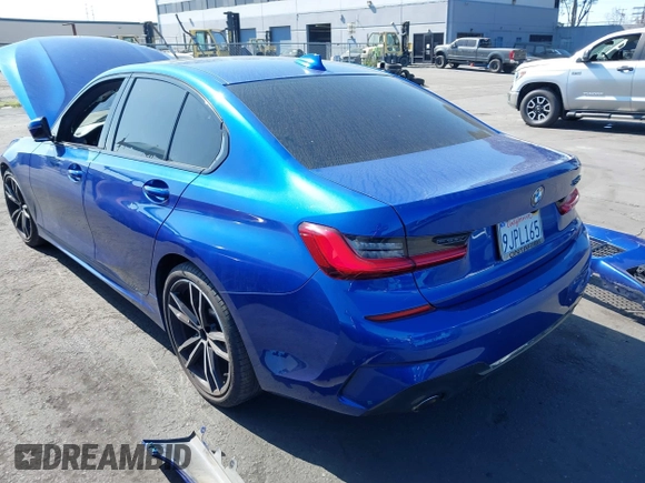 2020 BMW 3 Series 330i with VIN WBA5R1C06LFH38996, listed as a IAAI auction lot 41664442 with Not Provided miles and . Bid and sale history available at carsss.com. Image 3.