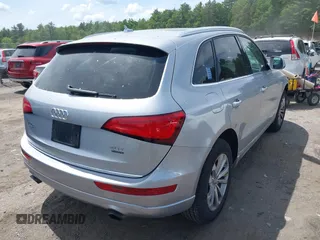 2015 Audi Q5 Premium Plus z VIN WA1LFAFP3FA069364, wystawiony jako IAAI lot #42364101 z przebiegiem 93 936 mil mil oraz . Historia ofert i sprzedaży dostępna na DreamBid. Obrazek 4.