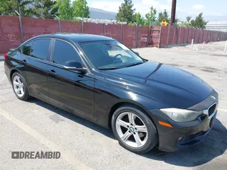 2013 BMW 3 Series 328i with VIN WBA3C1C50DF435120, listed as a IAAI auction lot 42132086 with 137,588 mi miles and . Bid and sale history available at carsss.com. Image 1.