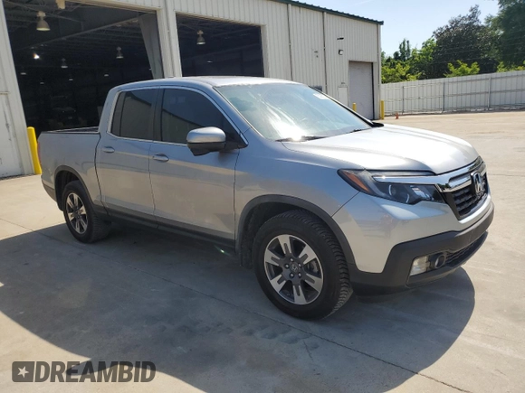2019 Honda Ridgeline RTL-T with VIN 5FPYK3F67KB031672, listed as a Copart auction lot 55080205 with 106,912 mi miles and Salvage title. Bid and sale history available at DreamBid. Image 4.
