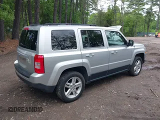 2011 Jeep Patriot Sport with VIN 1J4NF1GB0BD281031, listed as a IAAI auction lot 42203317 with 174,240 mi miles. Bid and sale history available at carsss.com. Image 4.
