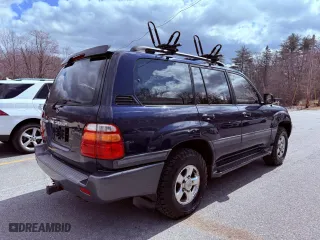 2002 Toyota Land Cruiser with VIN JTEHT05J622022972, listed as a Copart auction lot 54529135 with 299,548 mi miles and Clean Title. Bid and sale history available at carsss.com. Image 4.