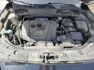 2018 Mazda CX-5 Grand Touring z VIN JM3KFADM2J1381752, wystawiony jako Copart lot #56889835 z przebiegiem 96 820 mil mil oraz Szkoda całkowita • Salvage title. Historia ofert i sprzedaży dostępna na DreamBid. Obrazek 11.