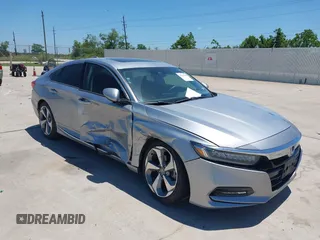 2019 Honda Accord Touring z VIN 1HGCV2F99KA002506, wystawiony jako IAAI lot #42233936 z przebiegiem 88 612 mil mil oraz . Historia ofert i sprzedaży dostępna na DreamBid. Obrazek 1.