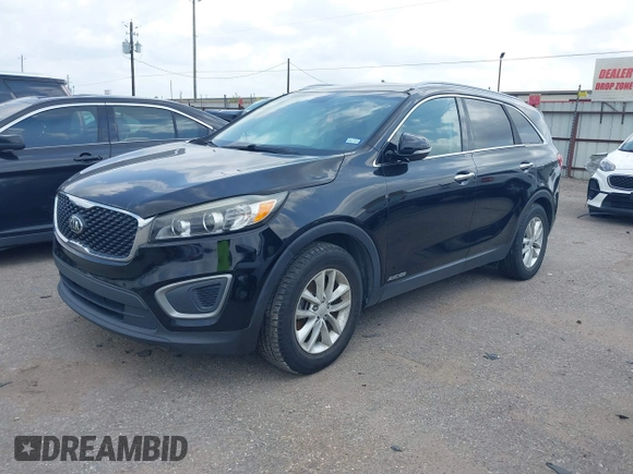 2016 Kia Sorento LX z VIN 5XYPGDA50GG112670, wystawiony jako IAAI lot #42170870 z przebiegiem 165 053 mil mil oraz . Historia ofert i sprzedaży dostępna na DreamBid. Obrazek 17.