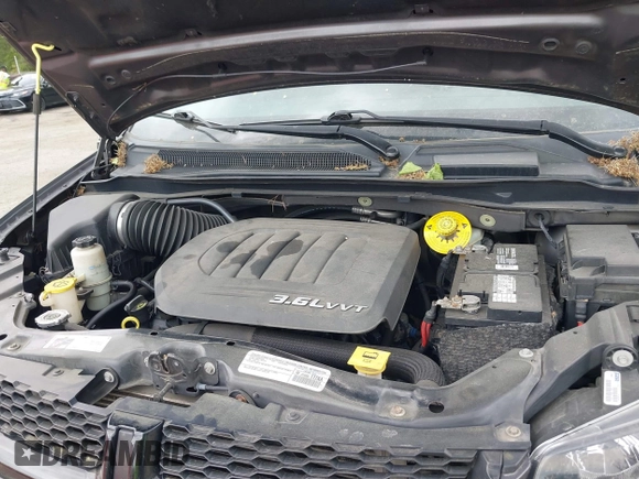 2015 Dodge Grand Caravan American Value with VIN 2C4RDGBG2FR542844, listed as a IAAI auction lot 42109983 with 129,718 mi miles and . Bid and sale history available at DreamBid. Image 10.