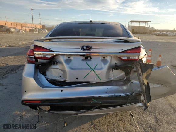 2017 Ford Fusion Energi Titanium with VIN 3FA6P0SUXHR379807, listed as a Copart auction lot 84885494 with 100,735 mi miles and Salvage Title. Bid and sale history available at carsss.com. Image 6.