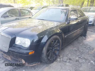 2006 Chrysler 300 C SRT8 with VIN 2C3LA73W66H249303, listed as a IAAI auction lot 42009645 with 137,242 mi miles. Bid and sale history available at carsss.com. Image 2.