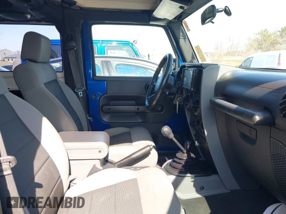 2009 Jeep Wrangler X with VIN 1J4FA24169L739367, listed as a IAAI auction lot 41810359 with 193,192 mi miles and . Bid and sale history available at carsss.com. Image 5.