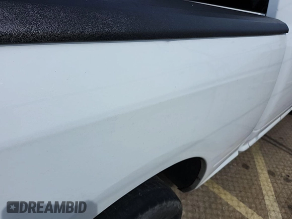 2013 Ram 1500 Tradesman z VIN 1C6RR6FP9DS560721, wystawiony jako IAAI lot #42598892 z przebiegiem 224 498 mil mil oraz . Historia ofert i sprzedaży dostępna na DreamBid. Obrazek 20.