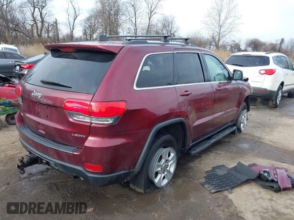 2017 Jeep Grand Cherokee Laredo with VIN 1C4RJFAG1HC844965, listed as a IAAI auction lot 41606739 with 82,144 mi miles. Bid and sale history available at carsss.com. Image 4.