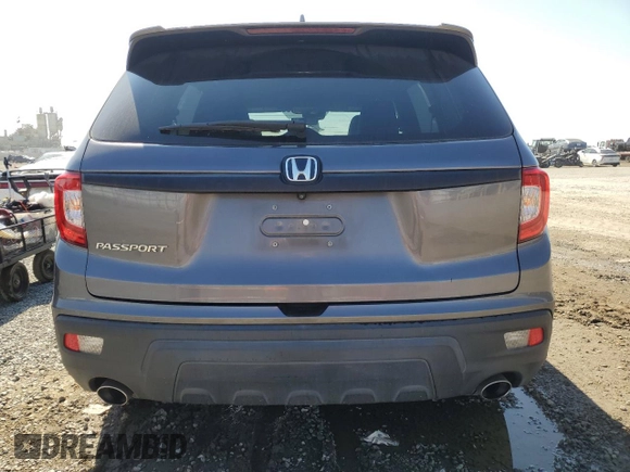 2019 Honda Passport EX-L with VIN 5FNYF7H58KB003906, listed as a Copart auction lot 46312795 with 59,417 mi miles and Salvage Title. Bid and sale history available at carsss.com. Image 6.