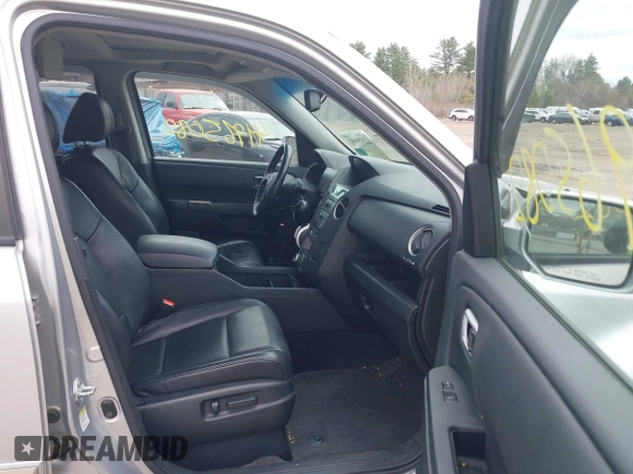 2011 Honda Pilot Touring with VIN 5FNYF4H90BB022354, listed as a IAAI auction lot 41965082 with 126,505 mi miles and . Bid and sale history available at carsss.com. Image 5.