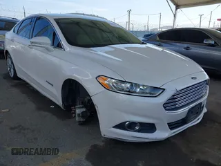 2013 Ford Fusion SE Hybrid z VIN 3FA6P0LU1DR310075, wystawiony jako IAAI lot #42085556 z przebiegiem Nie podano mil oraz . Historia ofert i sprzedaży dostępna na DreamBid. Obrazek 1.