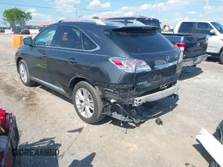 2010 Lexus RX 450h with VIN JTJBC1BA2A2003920, listed as a IAAI auction lot 42127344 with 147,015 mi miles and . Bid and sale history available at DreamBid. Image 3.