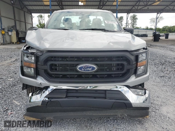 2023 Ford F-150 XL with VIN 1FTMF1C57PKF86630, listed as a Copart auction lot 59172785 with 14,840 mi miles and Salvage title. Bid and sale history available at DreamBid. Image 5.