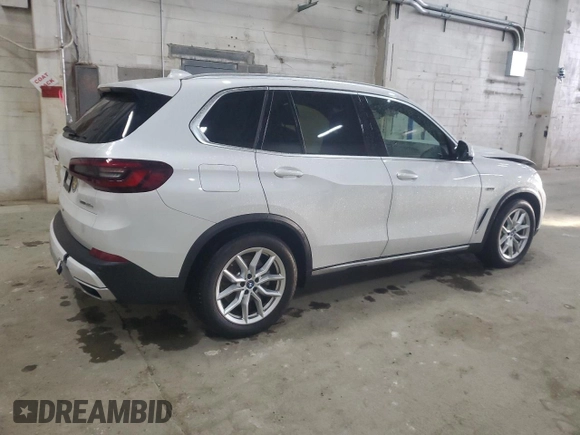 2022 BMW X5 xDrive45e with VIN 5UXTA6C02N9L87936, listed as a Copart auction lot 52728515 with 22,228 mi miles and Salvage Title. Bid and sale history available at carsss.com. Image 3.